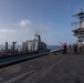 Abraham Lincoln conducts a fueling-at-sea with USNS Big Horn