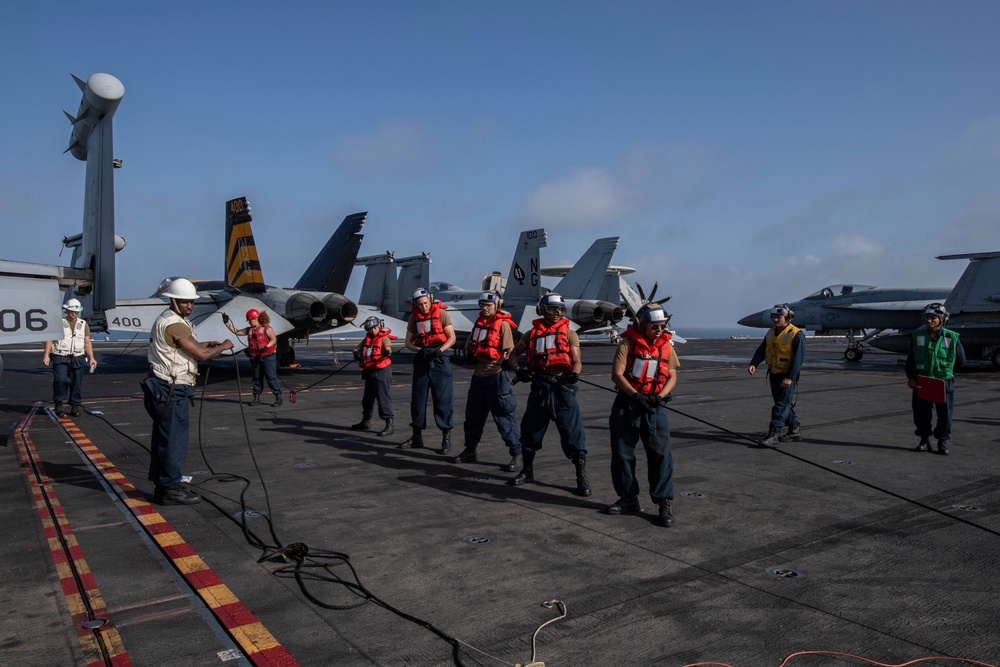 Abraham Lincoln conducts a fueling-at-sea with USNS Big Horn