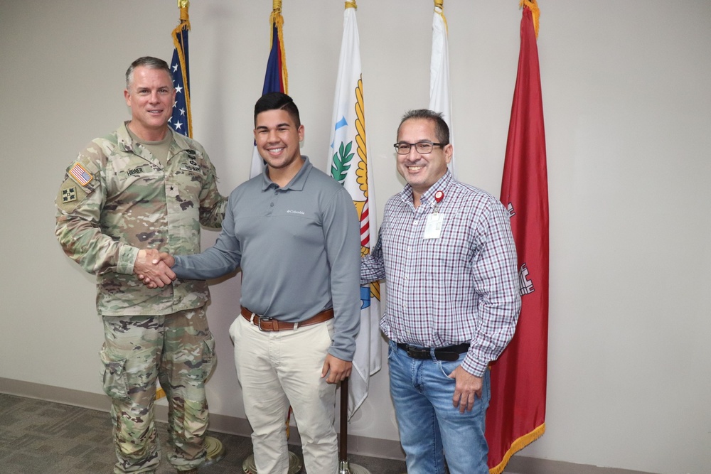 U.S. Army Corps of Engineers South Atlantic Division Commander, Brig. Gen. Daniel Hibner recognizes Jesús Acosta, for his outstanding support to the organization