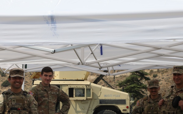 Military and Local Police Secure Evacuation Route