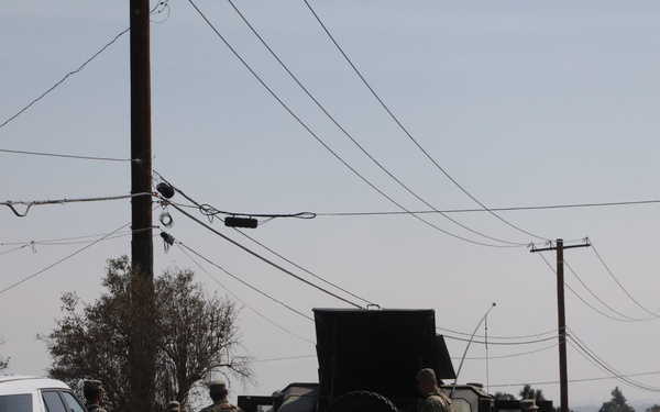 National Guard Soldiers Take a Break at Fire Evacuation Post