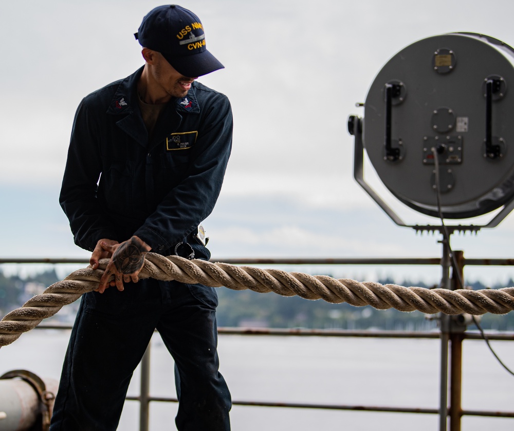 A Nimitz Sailor Heaves Line