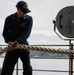 A Nimitz Sailor Heaves Line
