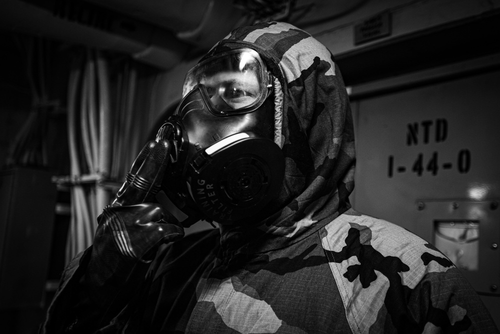 A Nimitz Sailor Dons J-List Gear During Simulation