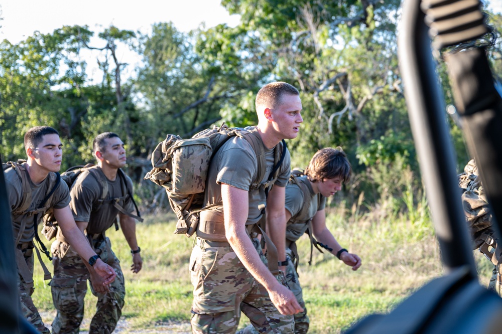 SERE selection ruck march