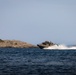 U.S. and Swedish Marines conduct live fire machine gun range from combat boats