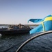 U.S. and Swedish Marines conduct live fire machine gun range from combat boats