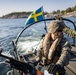 U.S. and Swedish Marines conduct live fire machine gun range from combat boats