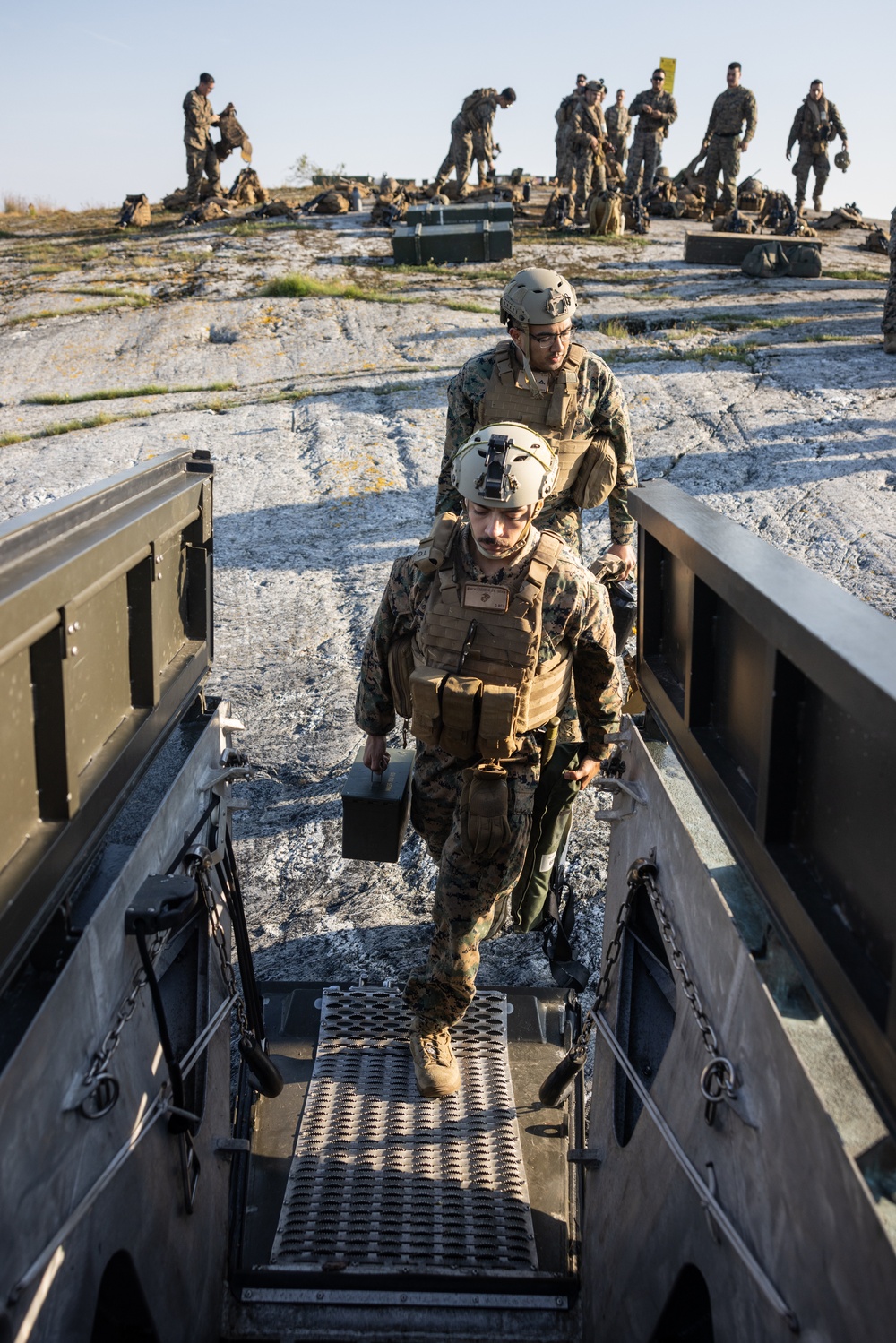 U.S. and Swedish Marines conduct live fire machine gun range from combat boats