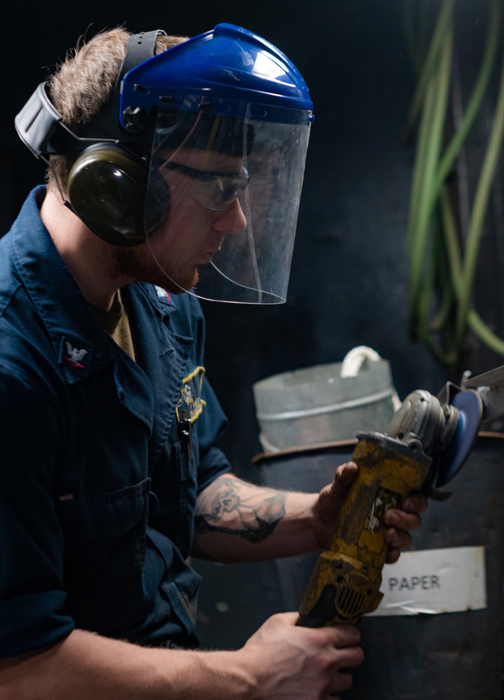 A Nimitz Sailor Grinds Metal