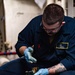 A Nimitz Sailor Conducts Maintenance