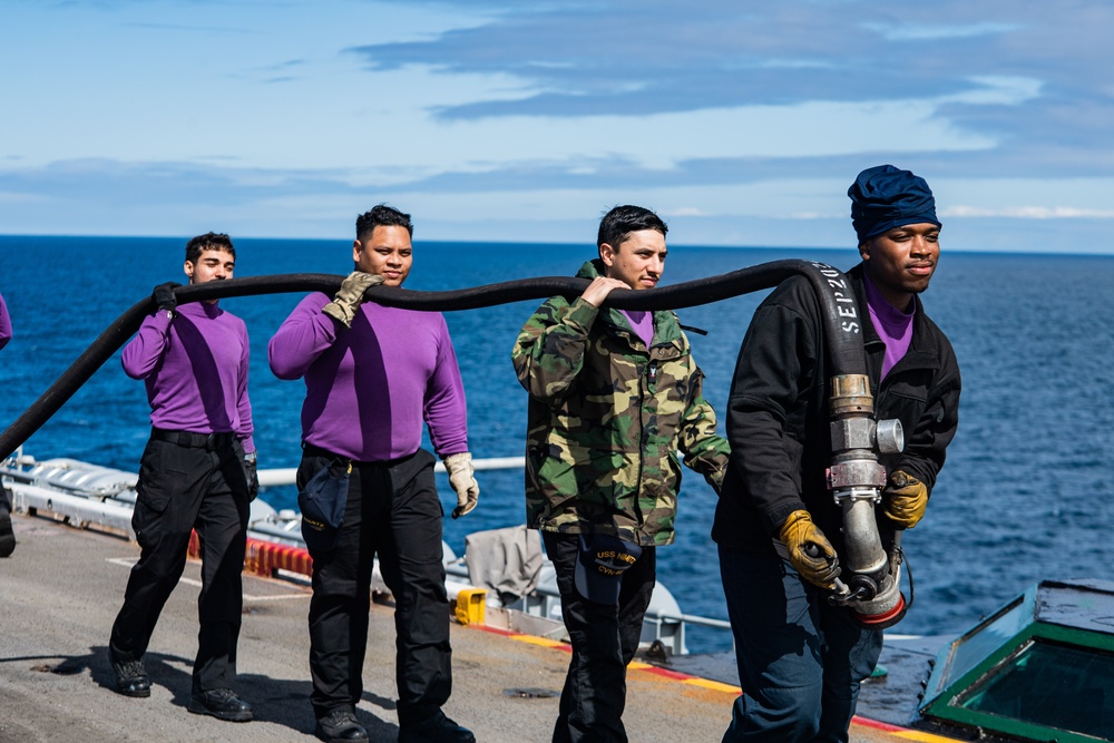 Nimitz Sailors Move a Fuel Hose