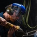 A Nimitz Sailor Grinds Metal