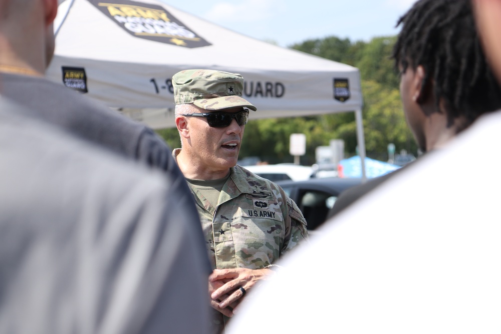 U.S. Army Brig. Gen. Leland L. Blanchard II, speaks with recruits joining the DCNG