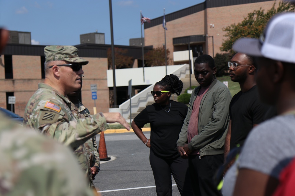 U.S. Army Brig. Gen. Leland L. Blanchard II, speaks with recruits joining the DCNG