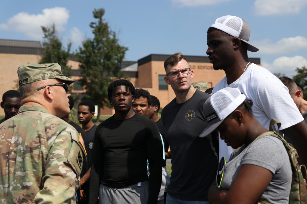 U.S. Army Brig. Gen. Leland L. Blanchard II, speaks with recruits joining the DCNG