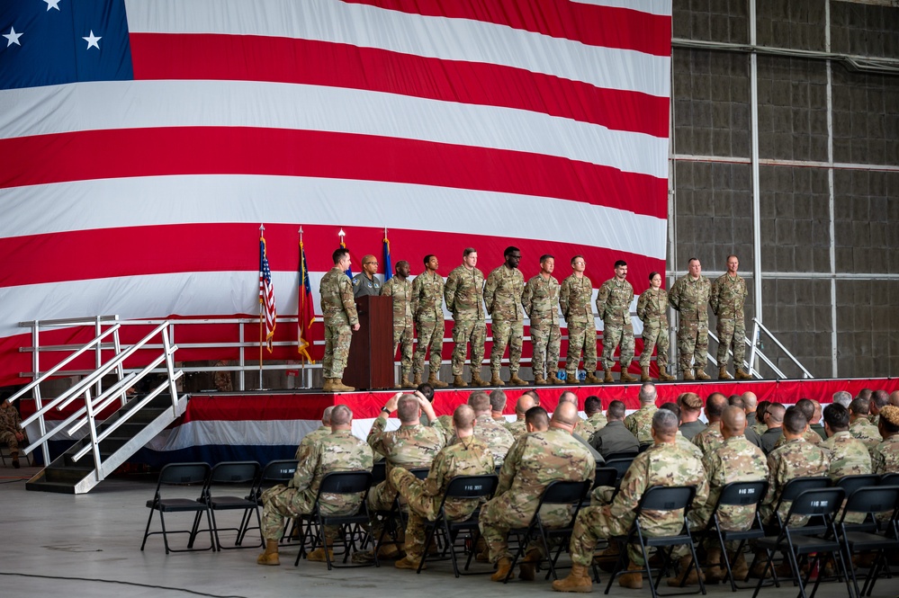 Photo of Georgia Air National Guard leadership holding all call for 116th Air Control Wing Airmen