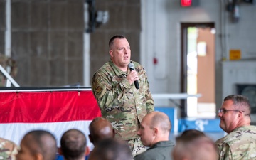 Photo of Georgia Air National Guard leadership holding all call for 116th Air Control Wing Airmen