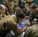 U.S. Marine Corps Mountain Warfare Instructors conduct long-range movement with Argentine marines