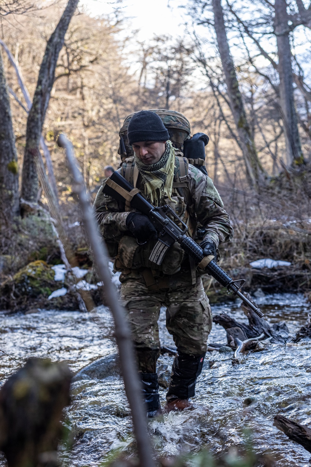 U.S. Marine Corps Mountain Warfare Instructors conduct long-range movement with Argentine marines