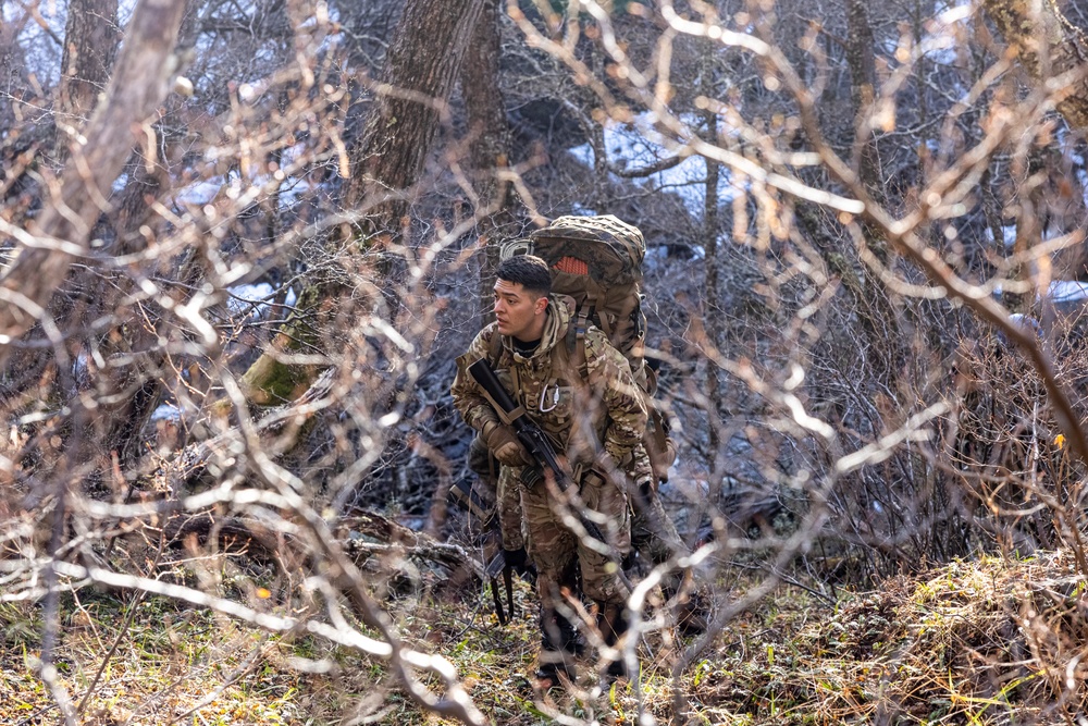 U.S. Marine Corps Mountain Warfare Instructors conduct long-range movement with Argentine marines