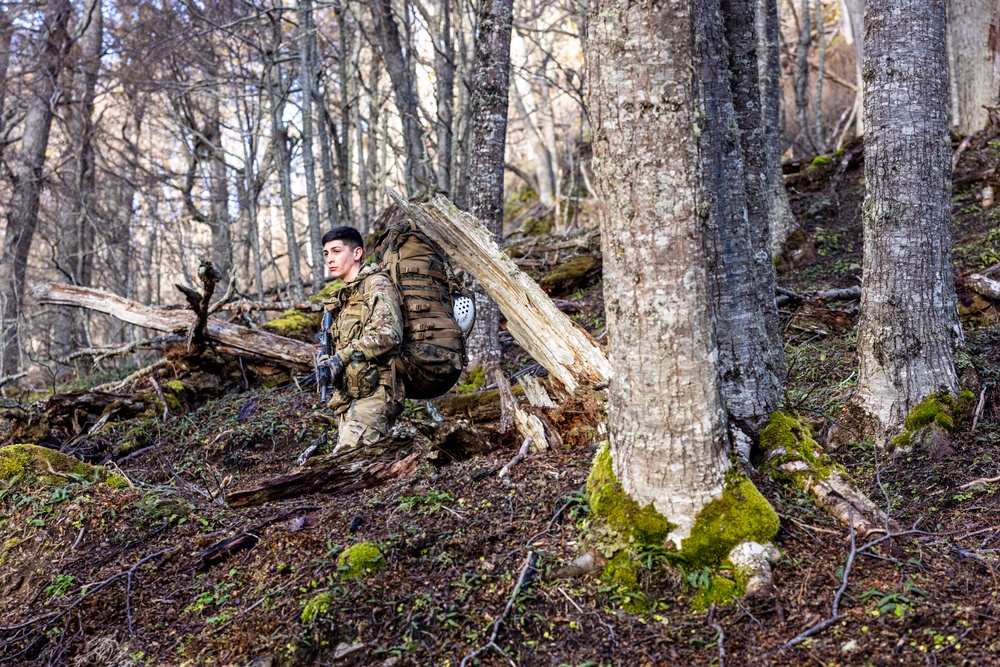 U.S. Marine Corps Mountain Warfare Instructors conduct long-range movement with Argentine marines