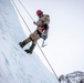 U.S. Marine Corps Mountain Warfare Instructors climb an ice wall with Argentine marines
