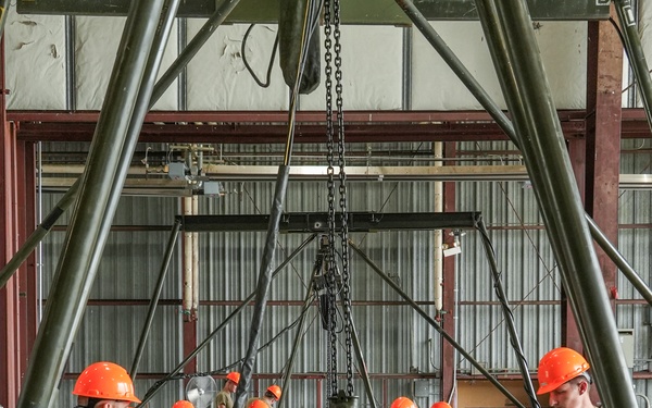 Munitions and weapons troops work together to complete a challenging fragmentation order.