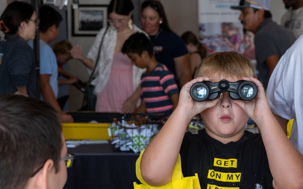 Airmen showcase equipment at Play on a Plane