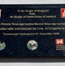 A commemorative plaque is visible outside the newly constructed kindergarten in Tosontsengel