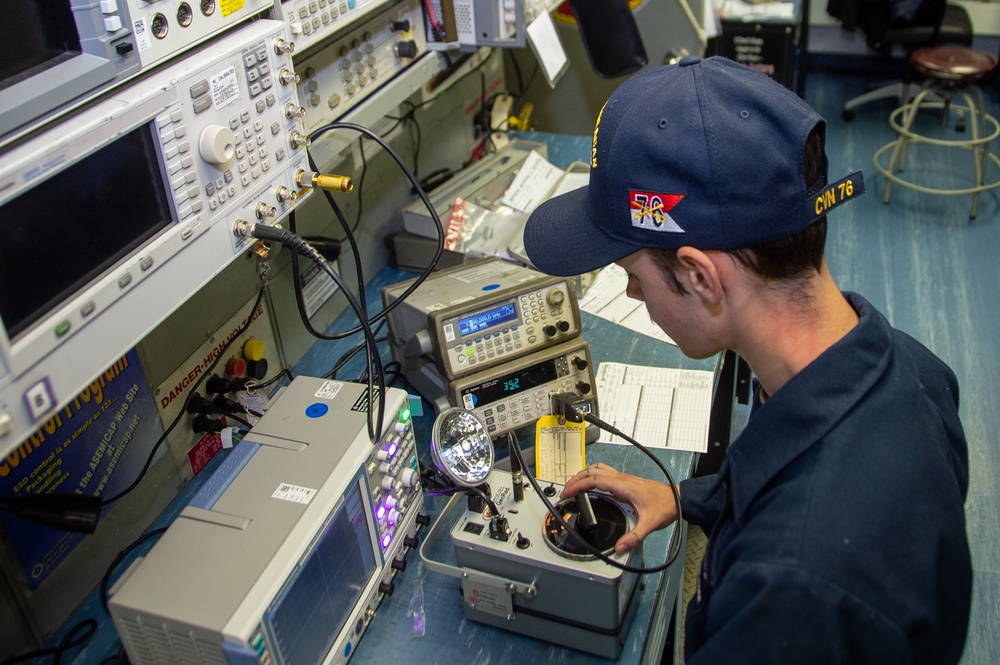 USS Ronald Reagan (CVN 76) Sailors conduct maintenance