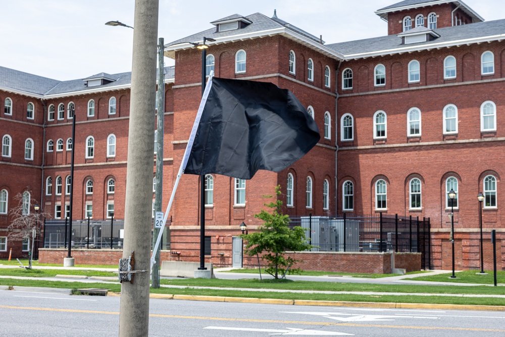 Evacuation Signage and Black Flags Help Protect Norfolk Naval Shipyard Workforce