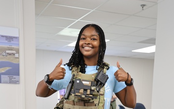 JPEO-CBRND Intern tries on wearables equipment