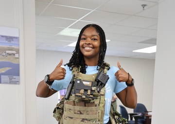 JPEO-CBRND Intern tries on wearables equipment