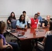 Mr. Colvin, Ms. Kilgore, and Chief of Staff for JPEO-CBRND meet with Interns on Wearables Demo