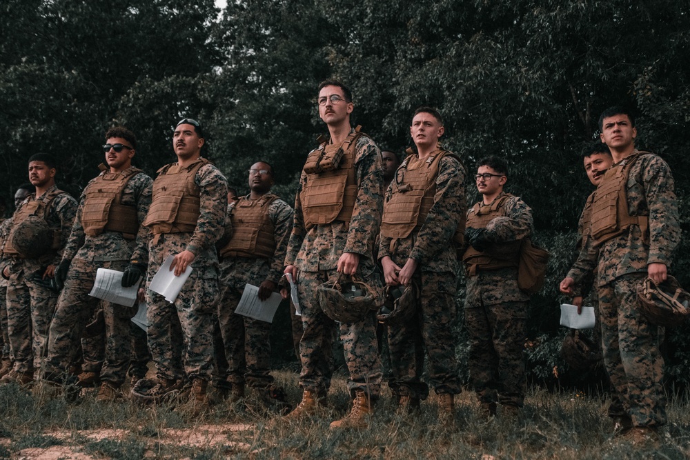 U.S. Marines with Security Battalion, Marine Corps Base Quantico, participate in a machine gun range