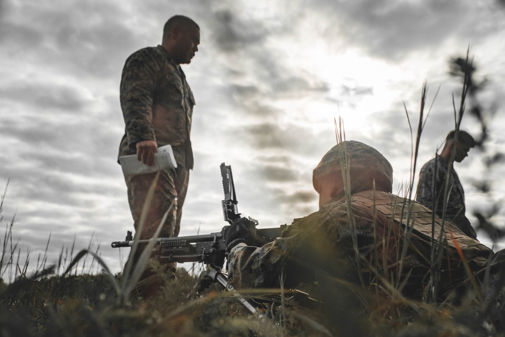 U.S. Marines with Security Battalion, Marine Corps Base Quantico, participate in a machine gun range