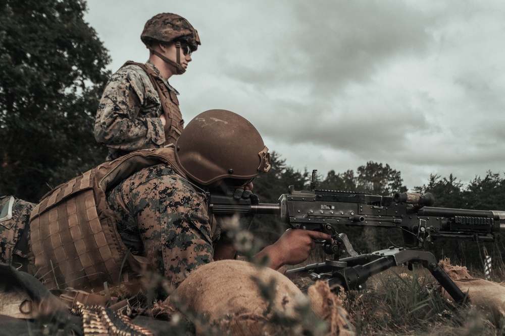 U.S. Marines with Security Battalion, Marine Corps Base Quantico, participate in a machine gun range