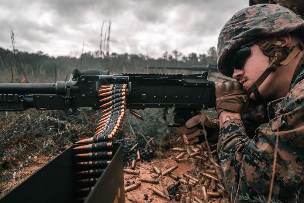 U.S. Marines with Security Battalion, Marine Corps Base Quantico, participate in a machine gun range