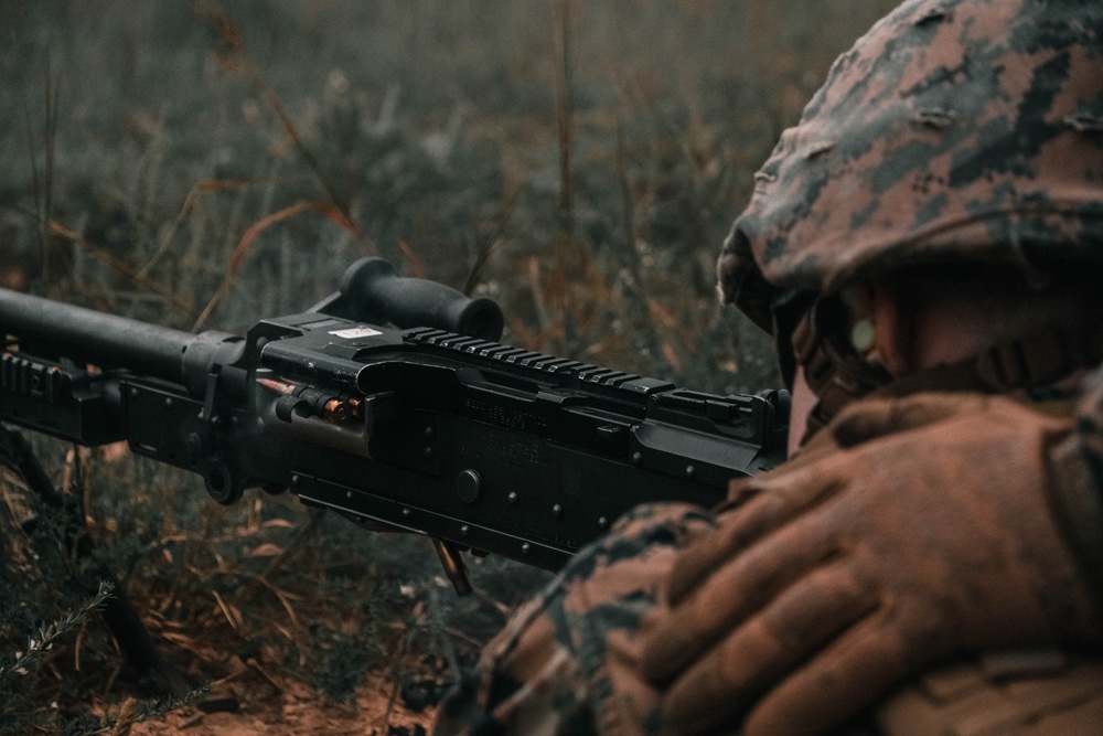 U.S. Marines with Security Battalion, Marine Corps Base Quantico, participate in a machine gun range