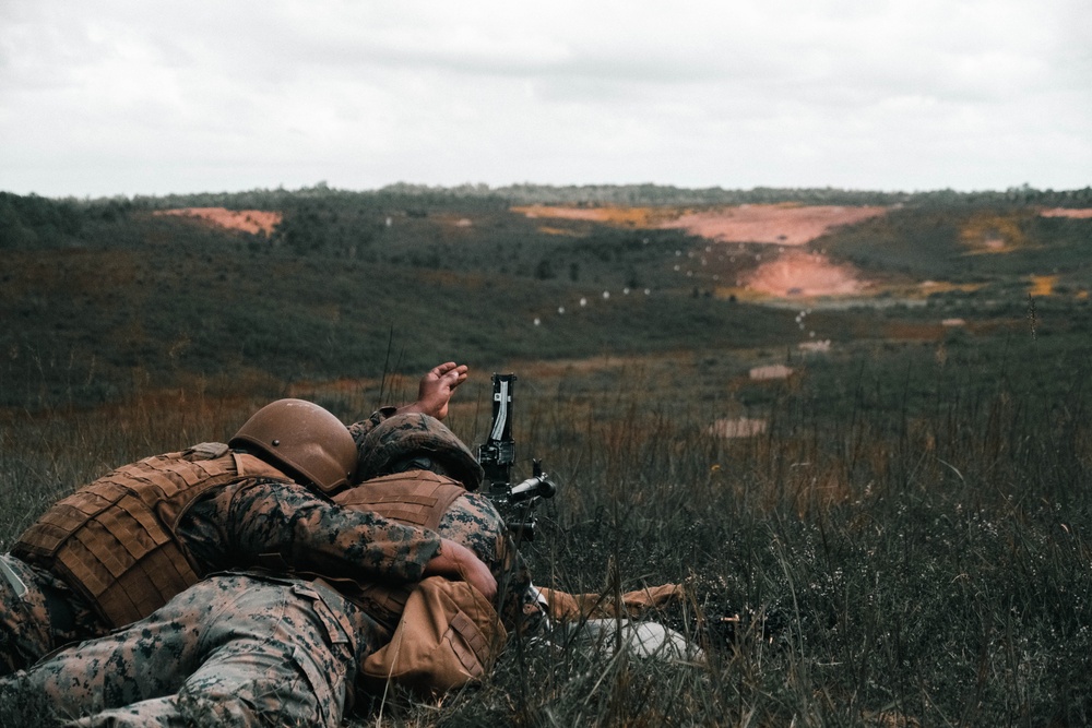 U.S. Marines with Security Battalion, Marine Corps Base Quantico, participate in a machine gun range