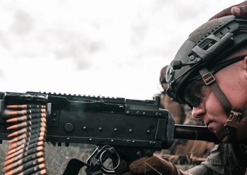 U.S. Marines with Security Battalion, Marine Corps Base Quantico, participate in a machine gun range