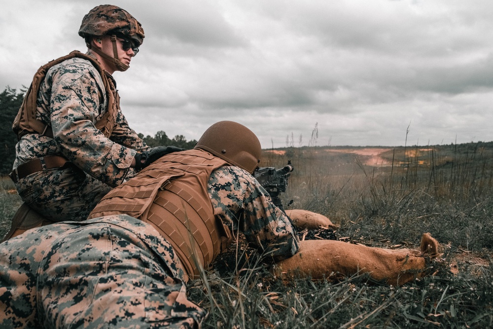 U.S. Marines with Security Battalion, Marine Corps Base Quantico, participate in a machine gun range