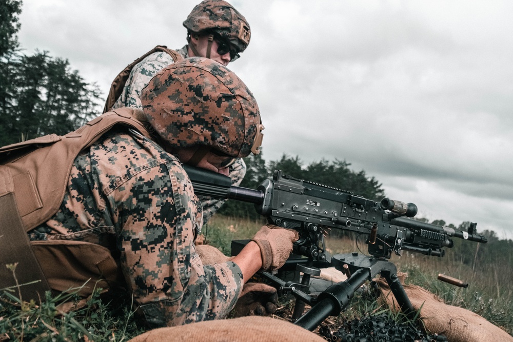 U.S. Marines with Security Battalion, Marine Corps Base Quantico, participate in a machine gun range