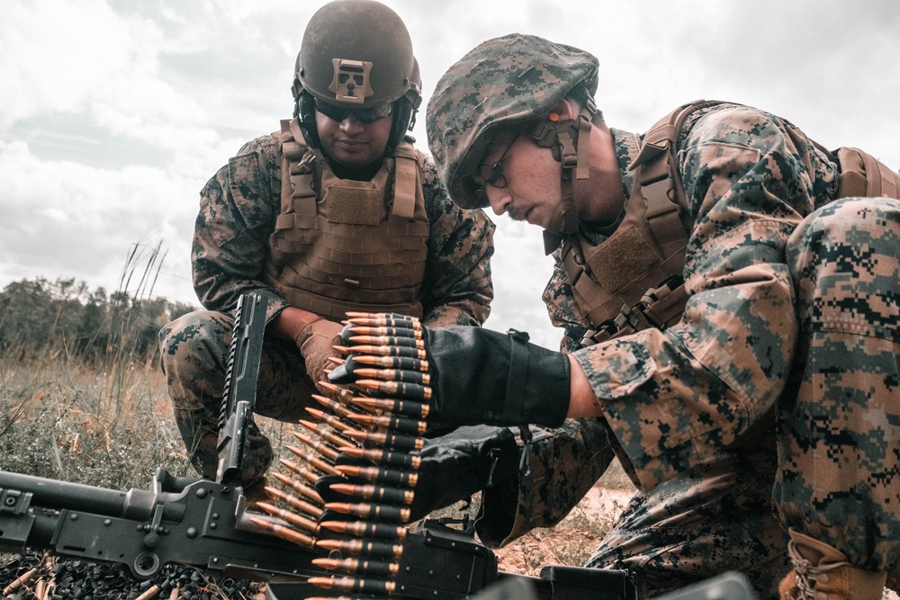 U.S. Marines with Security Battalion, Marine Corps Base Quantico, participate in a machine gun range