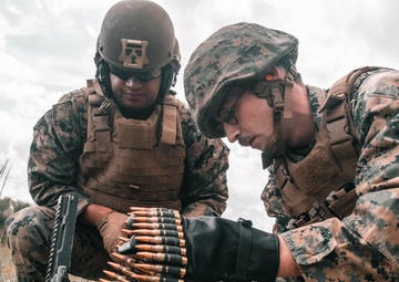 U.S. Marines with Security Battalion, Marine Corps Base Quantico, participate in a machine gun range