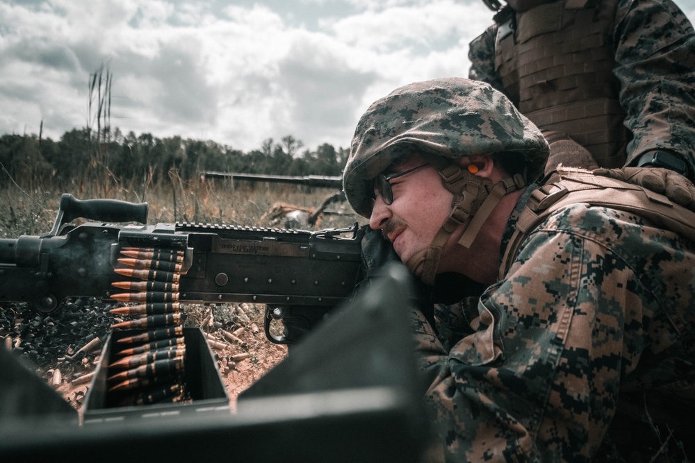 U.S. Marines with Security Battalion, Marine Corps Base Quantico, participate in a machine gun range