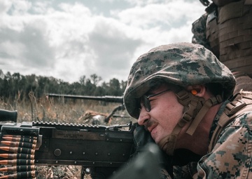U.S. Marines with Security Battalion, Marine Corps Base Quantico, participate in a machine gun range