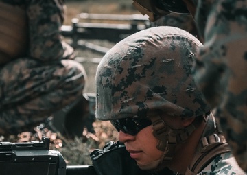 U.S. Marines with Security Battalion, Marine Corps Base Quantico, participate in a machine gun range