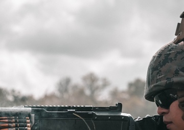 U.S. Marines with Security Battalion, Marine Corps Base Quantico, participate in a machine gun range